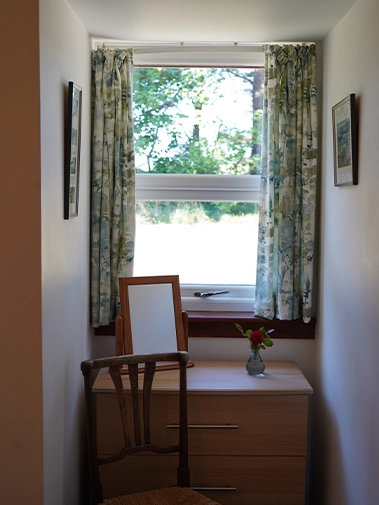 A peaceful little corner with a view — perfect for writing postcards or getting ready at your own pace
